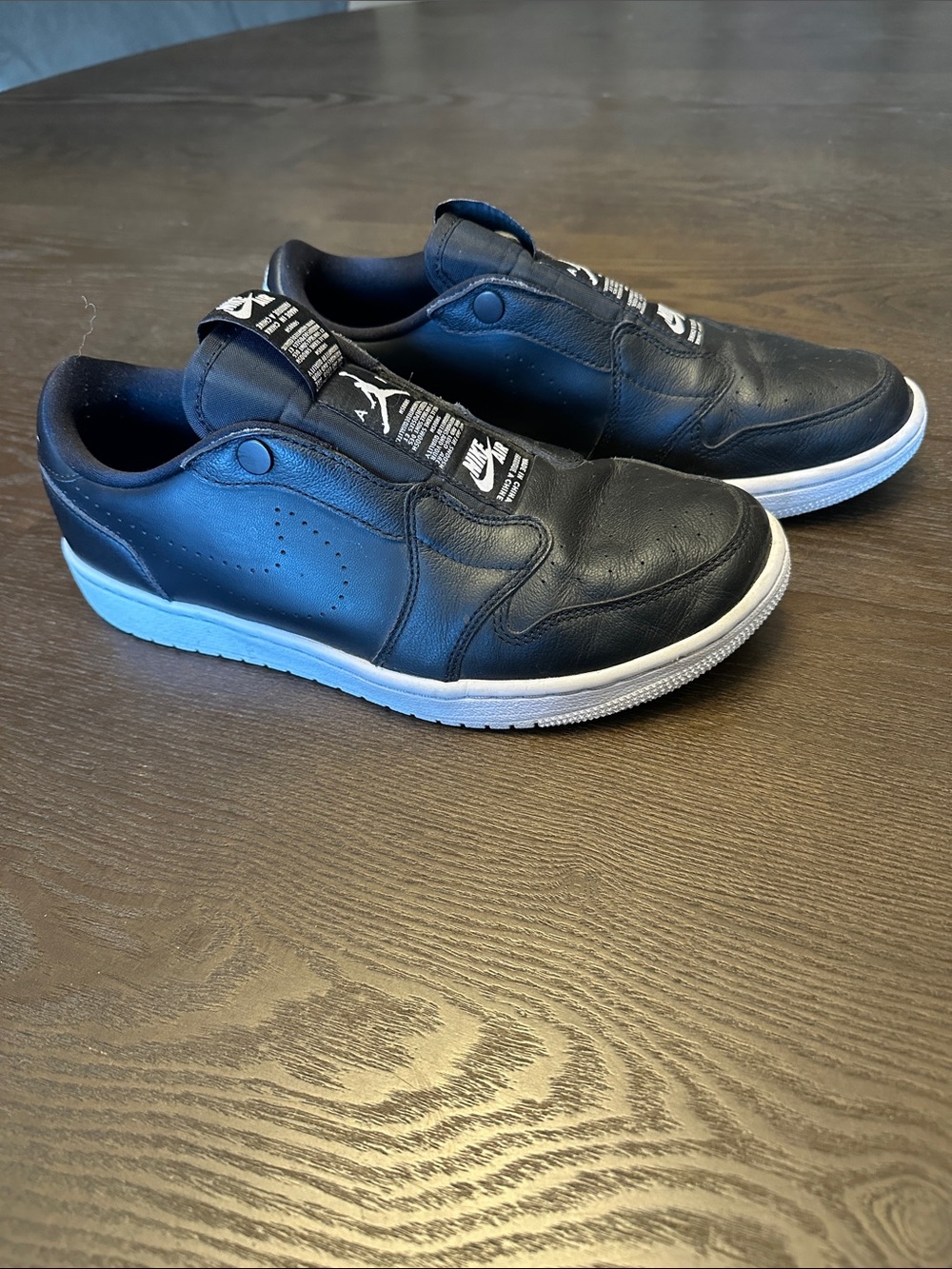 Nike Black Low-Top Slip-On Sneakers with White Sole